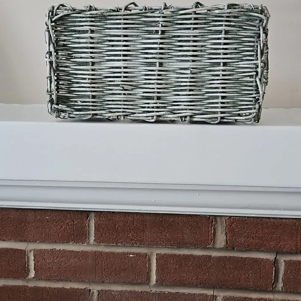 Vintage basket decorated with ceramic tiles